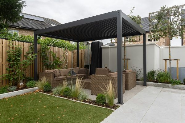 backyard pergola featuring outdoor lounging furniture